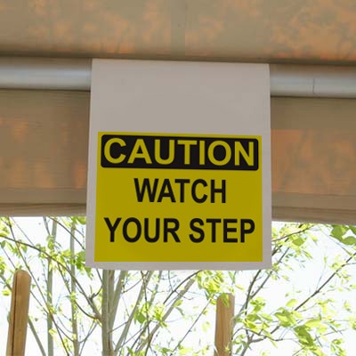 CAUTION - Watch your step hanging sign