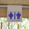 Restroom hanging sign
