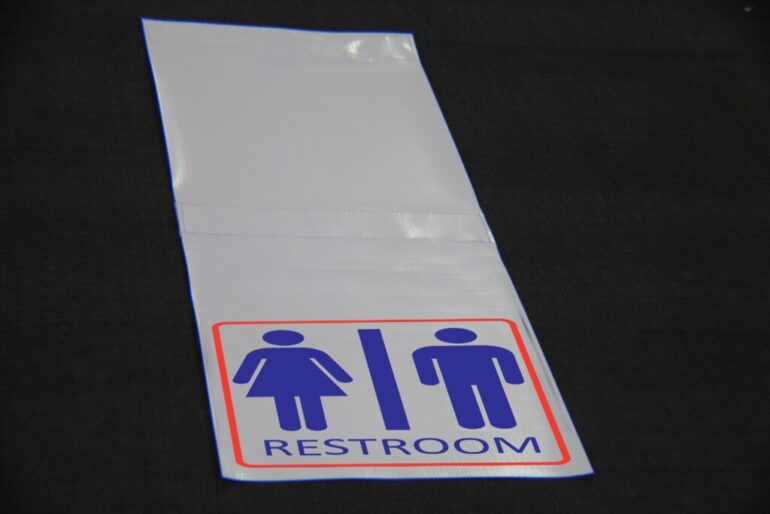 Restroom hanging sign